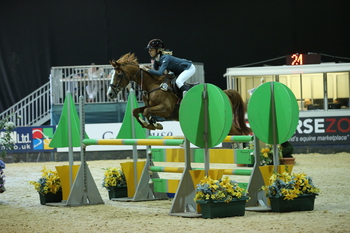Millie Dickinson takes centre stage in the Pony Restricted 1.10m Championship Final